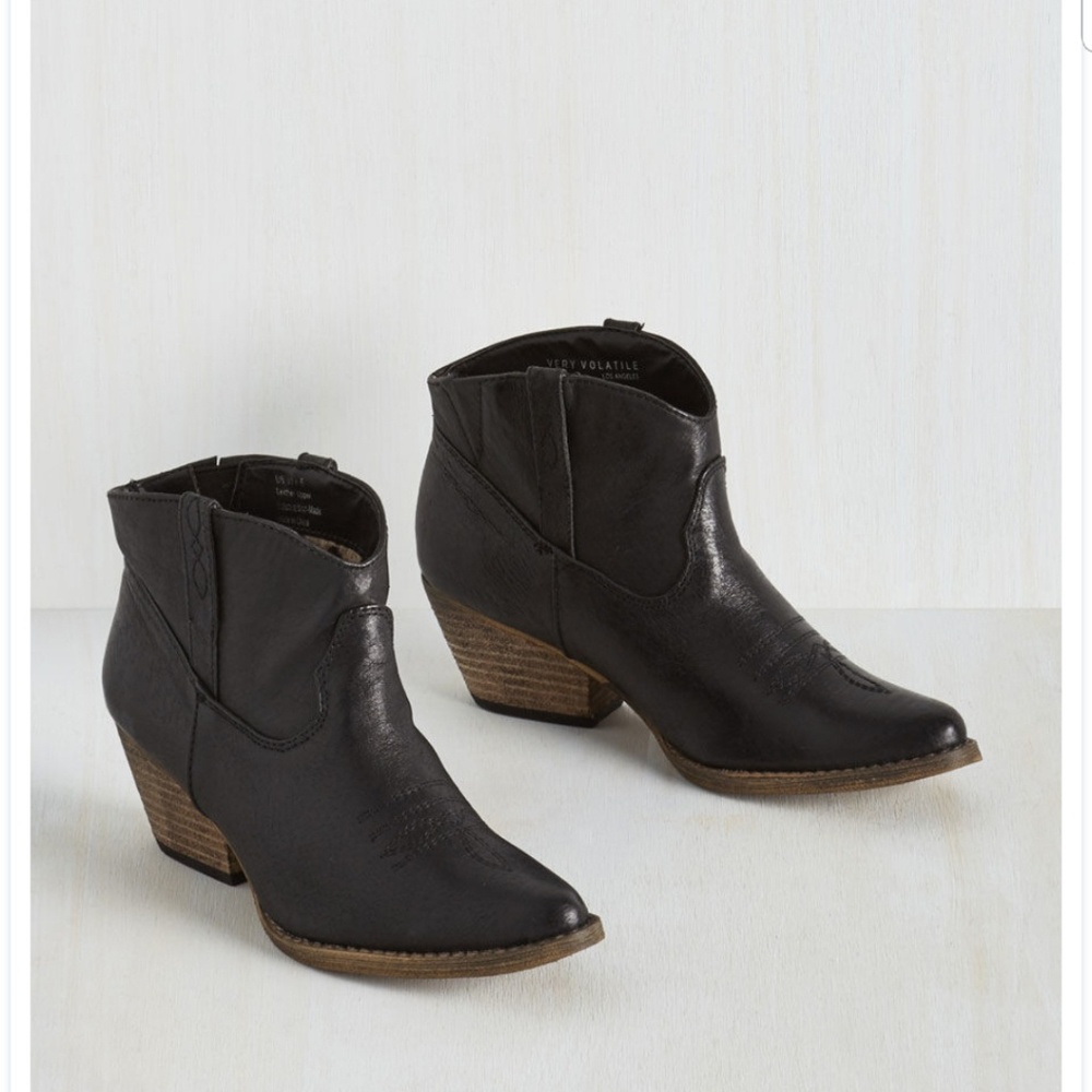 Black booties with wood heel